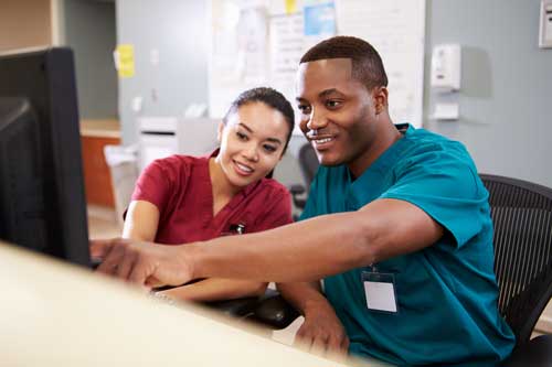 OC Veterinary Assistant School---Veterinary Technician Student Using Computer